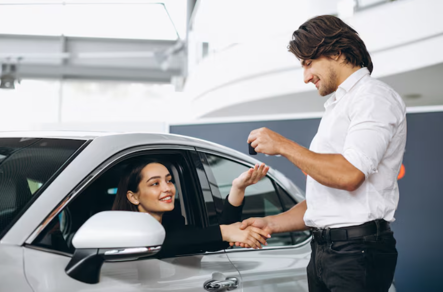 Buyer using smart credit tips before buying a car to secure better financing.