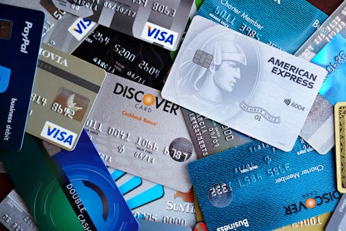Secured vs unsecured credit cards explained through multiple credit card types displayed together