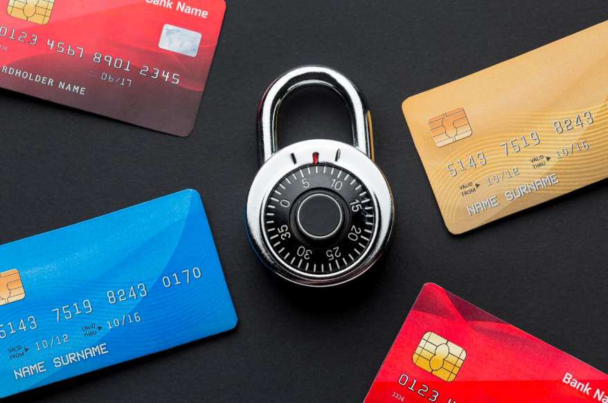 Credit cards secured with padlock illustrating freeze lock or monitor your credit