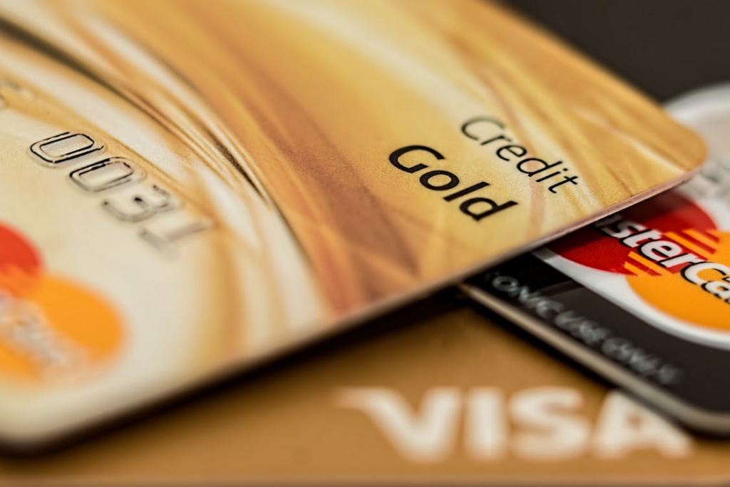 Close-up of multiple credit cards representing credit age and long-term financial stability.