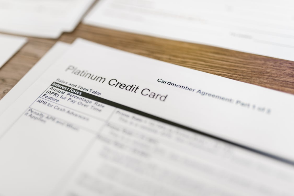 Credit card agreement illustrating how to optimize credit utilization ratio for better credit scores